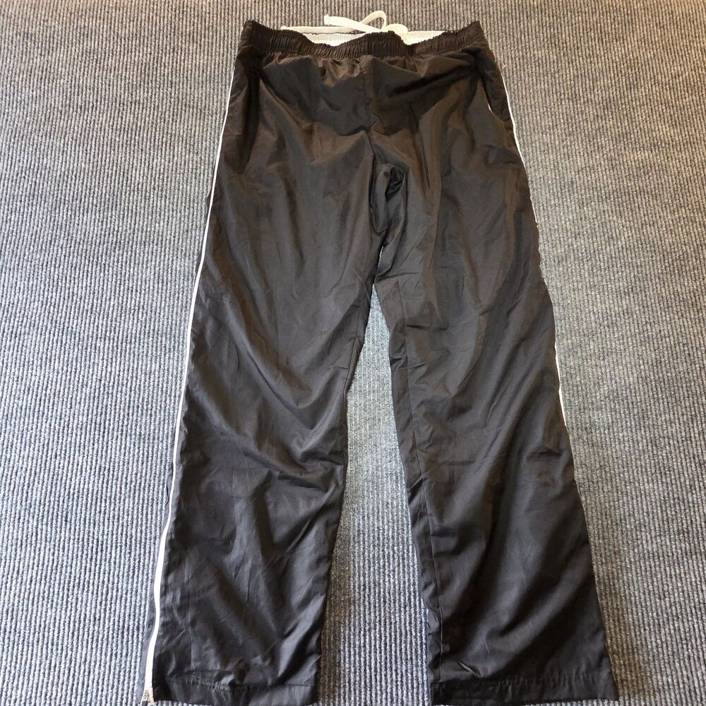 Danskin Now Track Wind Pants Women L Black Lined Athletic Side Stripe Zip Ankle